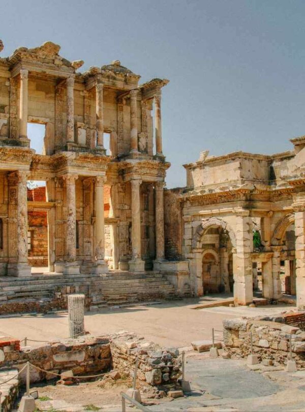 Ancient ruins of the Celsus Library in Ephesus, Turkey, showcasing grand columns and intricate stone carvings.